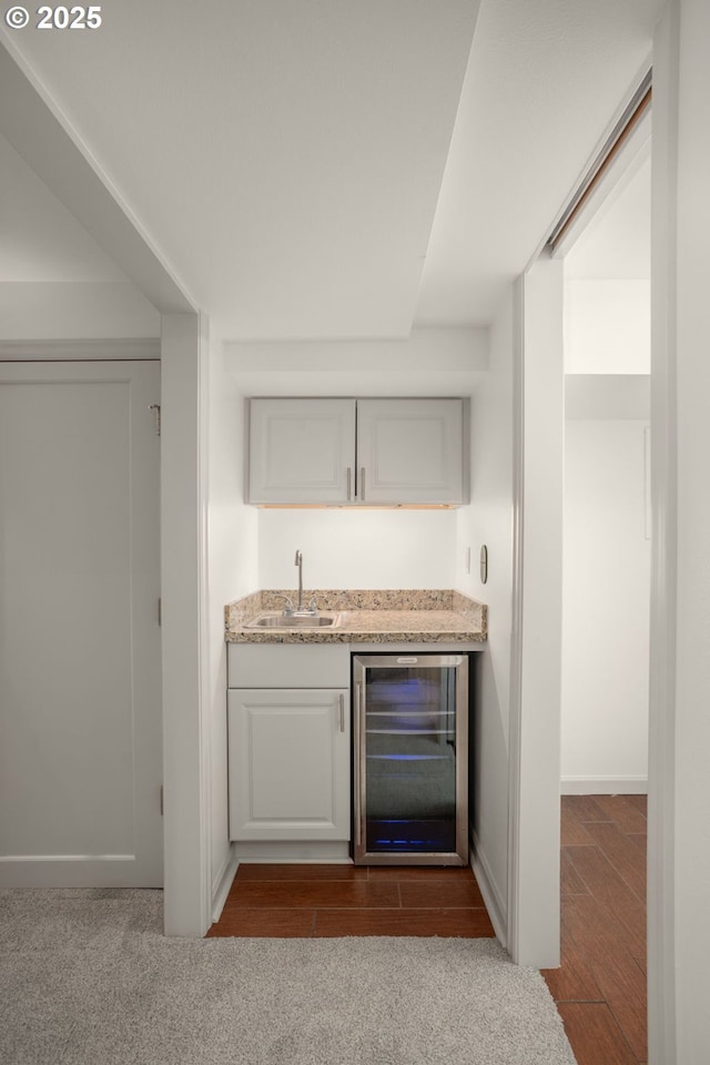7414 N Chautauqua Blvd, Portland, OR 97217 - indoor wet bar with beverage cooler and dark wood-type flooring
