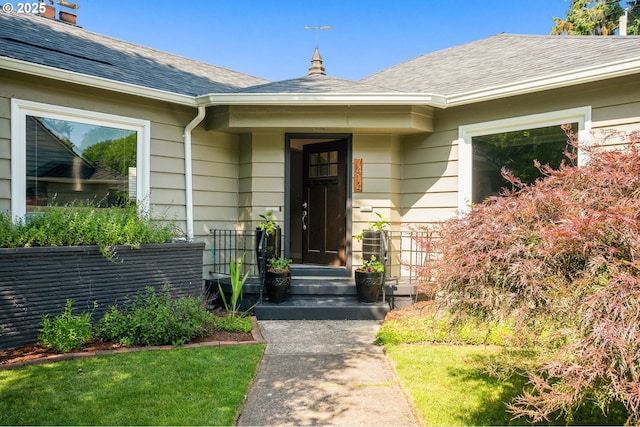 7414 N Chautauqua Blvd, Portland, OR 97217 - doorway to property with a shingled roof