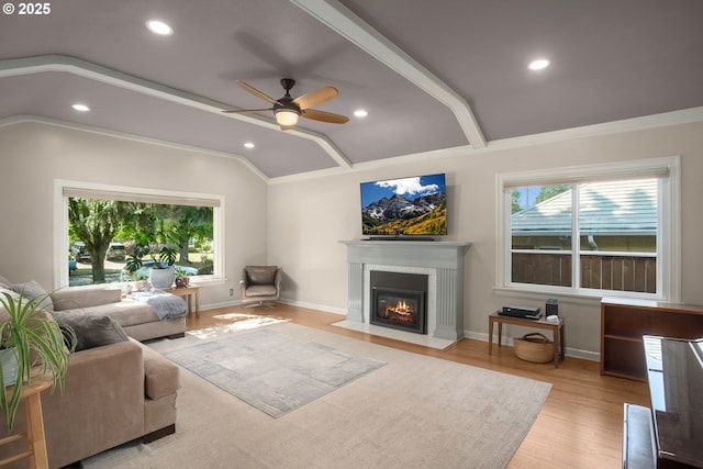 7414 N Chautauqua Blvd, Portland, OR 97217 - living room featuring healthy amount of natural light, a ceiling fan, a fireplace with flush hearth, lofted ceiling, and recessed lighting