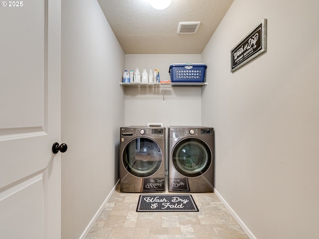 11411 NE 131st Pl, Vancouver, WA 98682 - washroom with laundry area, separate washer and dryer, baseboards, and visible vents