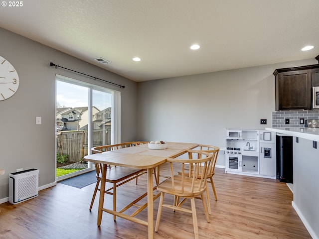 11411 NE 131st Pl, Vancouver, WA 98682 - dining room with visible vents, baseboards, light wood finished floors, and recessed lighting