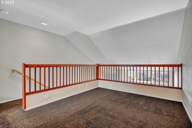 unfurnished room with vaulted ceiling, recessed lighting, carpet, and baseboards