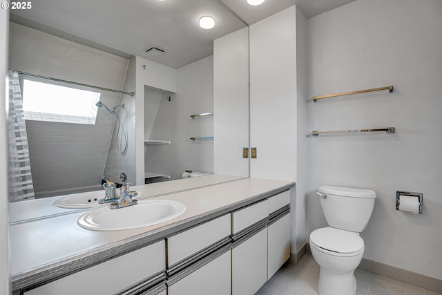 full bathroom featuring vanity, visible vents, tiled shower, tile patterned flooring, and toilet