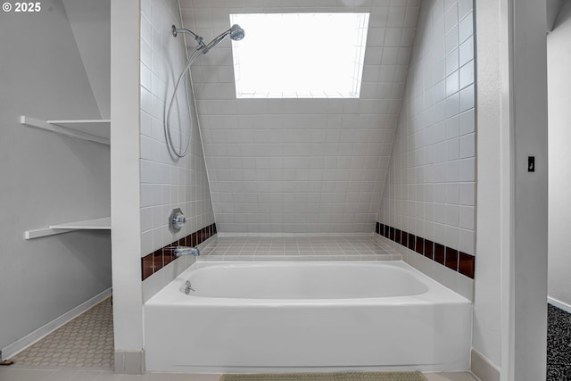 full bathroom featuring bathtub / shower combination, tile patterned floors, and baseboards