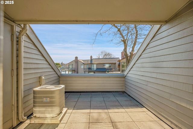 view of patio / terrace featuring a balcony and central AC unit