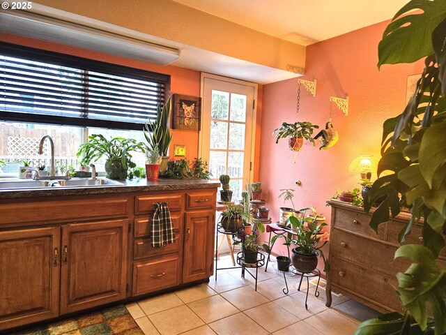 215 NE 9th St, Oakland, OR 97462 - dining room featuring dark wood finished floors, arched walkways, a textured ceiling, and a textured wall
