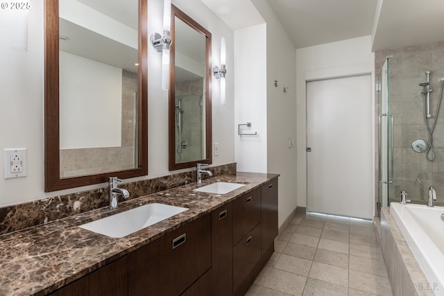 bathroom featuring vanity, tile patterned floors, and plus walk in shower