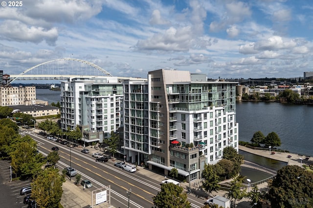 view of property with a water view