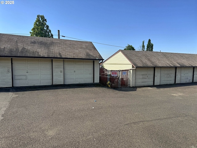 garage with fence