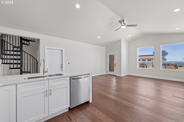 30403 Sawyer Way, Gold Beach, OR 97444 - kitchen with dishwasher, a sink, lofted ceiling, ceiling fan, and white cabinetry