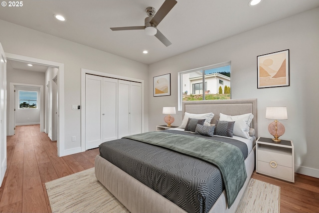 30403 Sawyer Way, Gold Beach, OR 97444 - bedroom with wood finished floors, recessed lighting, baseboards, a closet, and ceiling fan