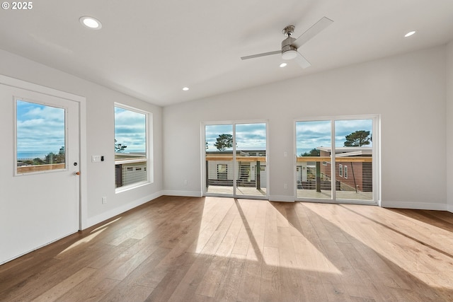 30403 Sawyer Way, Gold Beach, OR 97444 - empty room featuring wood-type flooring, vaulted ceiling, recessed lighting, baseboards, and a ceiling fan