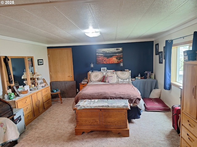 bedroom featuring light colored carpet