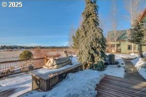 view of snow covered patio