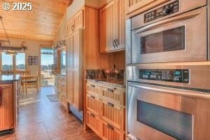 52995 Riverview Dr, La Pine, OR 97739 - kitchen with wooden ceiling, stainless steel double oven, and brown cabinetry