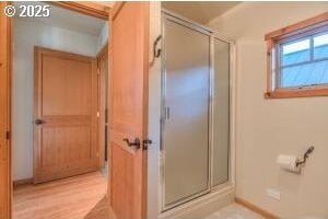 52995 Riverview Dr, La Pine, OR 97739 - full bathroom featuring a shower stall and baseboards