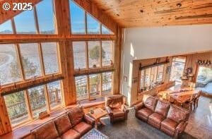 52995 Riverview Dr, La Pine, OR 97739 - living area with a high ceiling and wooden ceiling