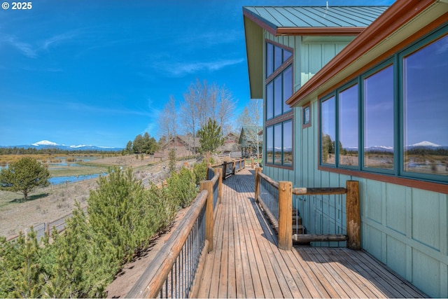 52995 Riverview Dr, La Pine, OR 97739 - wooden terrace featuring a water and mountain view
