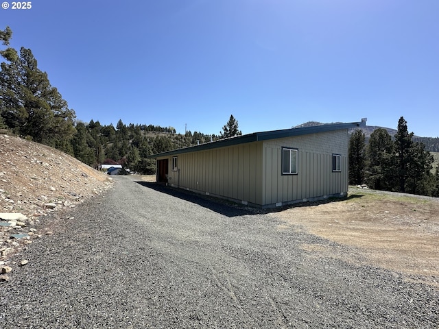 view of home's exterior with driveway
