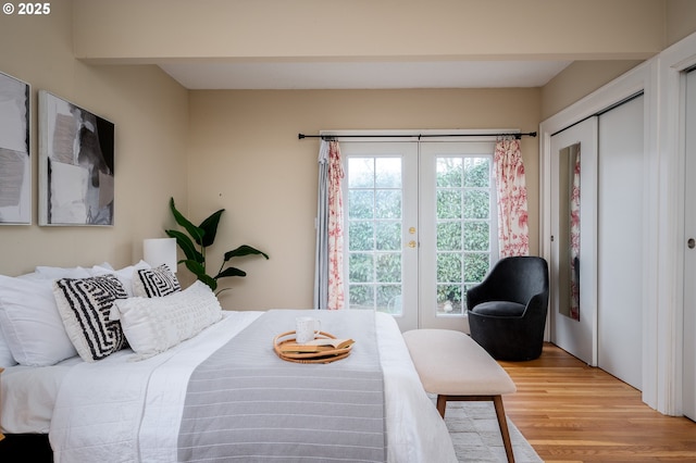 bedroom featuring light hardwood / wood-style flooring and a closet