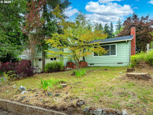 2625 Potter St, Eugene, OR 97405 - view of front of house featuring a chimney, a front lawn, crawl space, and a garage