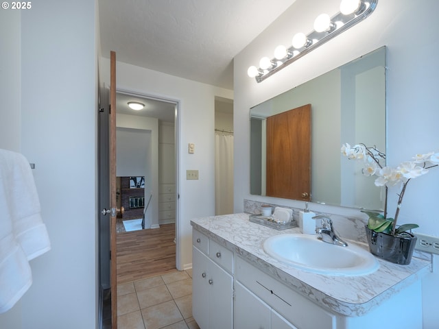 2625 Potter St, Eugene, OR 97405 - full bath with vanity, tile patterned flooring, and baseboards