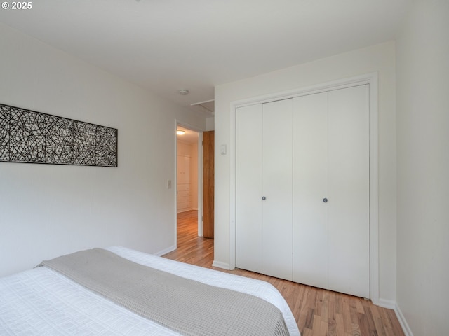 2625 Potter St, Eugene, OR 97405 - bedroom featuring wood finished floors, a closet, and baseboards