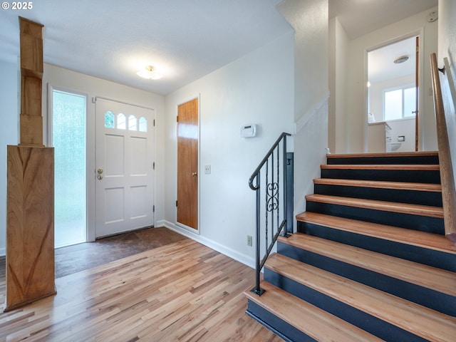 2625 Potter St, Eugene, OR 97405 - foyer with wood finished floors, stairway, and baseboards