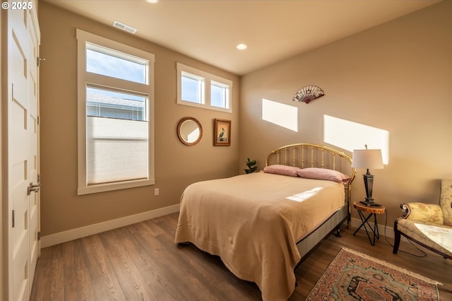 bedroom featuring dark hardwood / wood-style floors