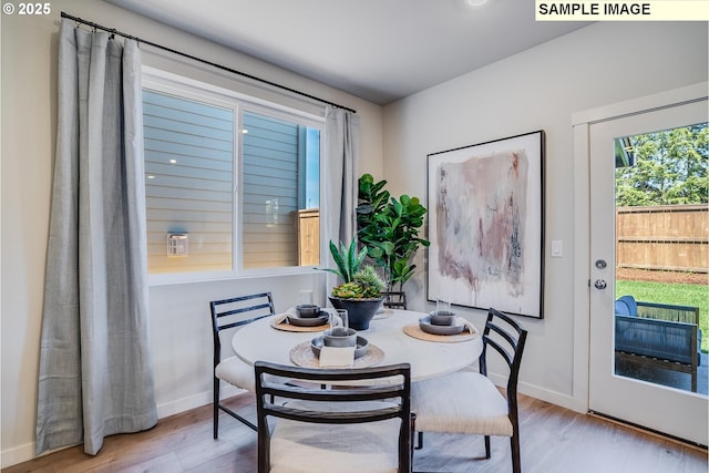 dining room featuring light hardwood / wood-style floors