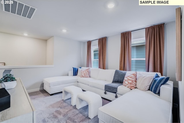 living room featuring light colored carpet