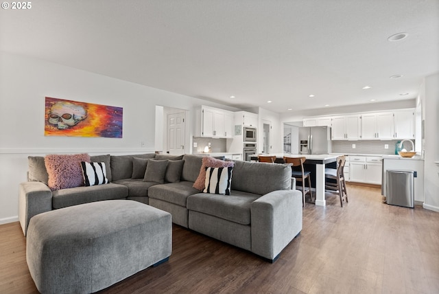 living room with hardwood / wood-style floors