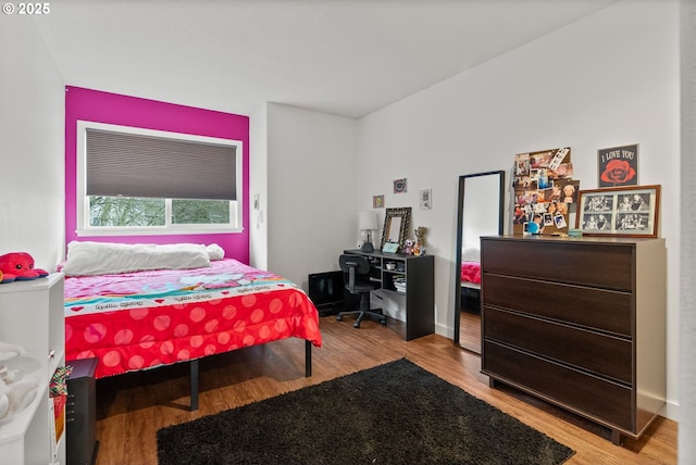 bedroom featuring light wood-type flooring