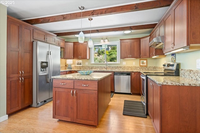 414 N Tomahawk Island Dr, Portland, OR 97217 - kitchen featuring stainless steel appliances, under cabinet range hood, beamed ceiling, light wood-style floors, and light stone countertops