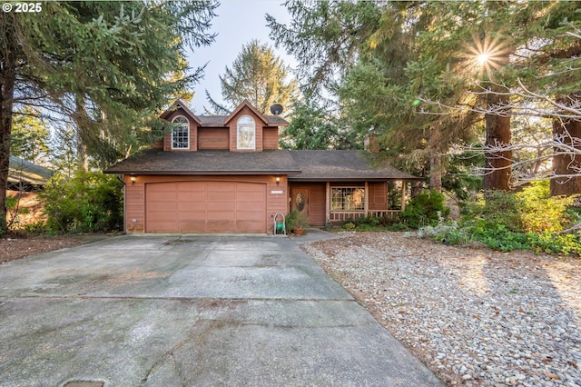 front of property featuring a garage and a porch