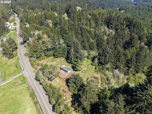 aerial view featuring a view of trees