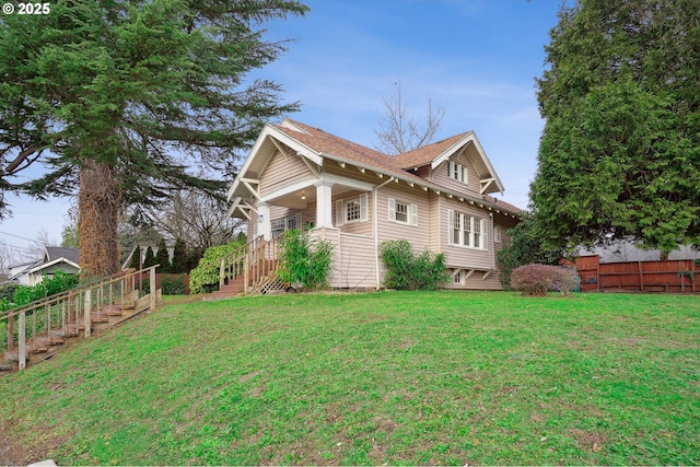 view of home's exterior with a lawn