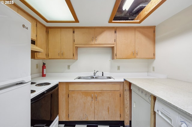 kitchen featuring sink and white appliances