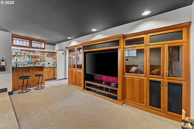 7237 S Corbett Ave, Portland, OR 97219 - living area with light colored carpet, bar area, and recessed lighting