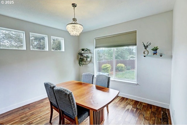 16295 SE Slate St, Damascus, OR 97089 - dining area with a chandelier, healthy amount of natural light, and baseboards