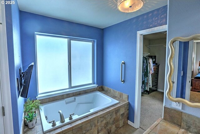 16295 SE Slate St, Damascus, OR 97089 - bathroom featuring plenty of natural light, a bath, and a walk in closet