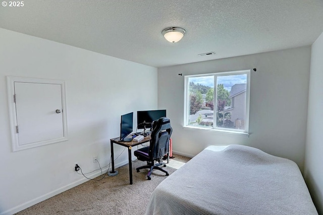 16295 SE Slate St, Damascus, OR 97089 - bedroom with carpet, a desk, baseboards, and a textured ceiling