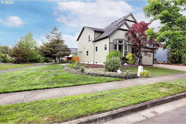 16295 SE Slate St, Damascus, OR 97089 - view of front of property with a front lawn, a garage, driveway, and board and batten siding