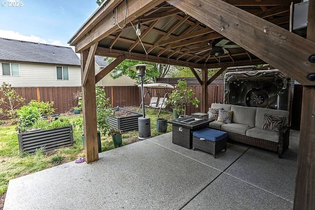 16295 SE Slate St, Damascus, OR 97089 - view of patio featuring a garden, a gazebo, a fenced backyard, and an outdoor hangout area