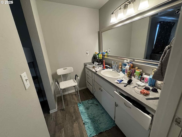 6307 NE Wilding Rd, Vancouver, WA 98686 - bathroom featuring vanity and wood finished floors