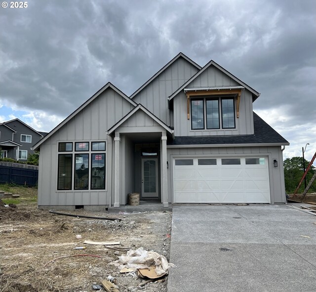 3517 N 11th Cir, Ridgefield, WA 98642 - view of front of property featuring concrete driveway, board and batten siding, and a garage