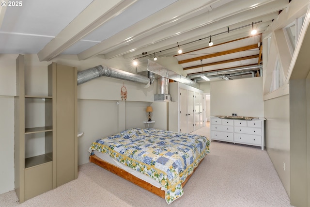 bedroom with carpet and beamed ceiling