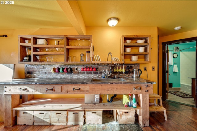 interior space with dark hardwood / wood-style floors and sink