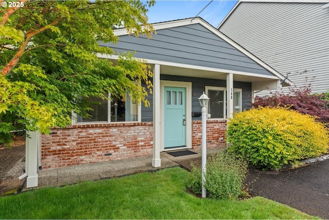 100 NE 78th Ave, Portland, OR 97213 - doorway to property with brick siding