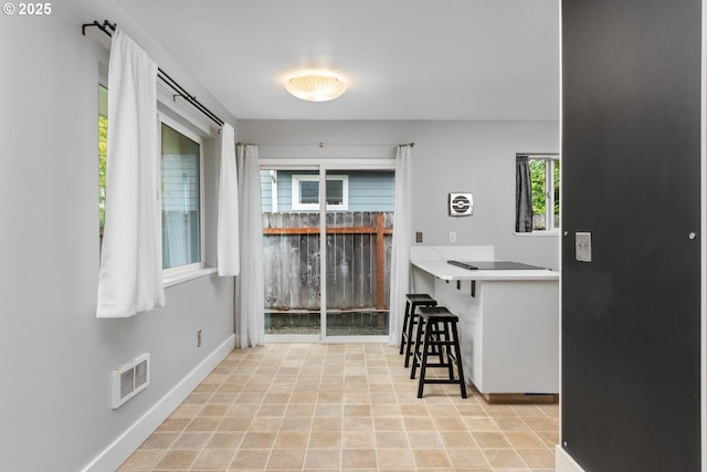 100 NE 78th Ave, Portland, OR 97213 - kitchen with a breakfast bar and baseboards